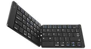 A foldable keyboard with a black case and white keys.