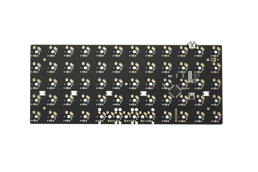 A close-up of a green printed circuit board (PCB) for a 60% mechanical keyboard. The PCB has a standard ANSI layout and supports Hot Swap switches.

