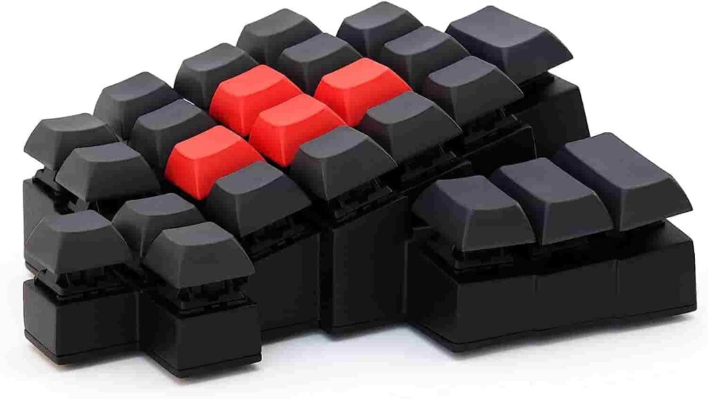 Corne keyboard with black and red design, featuring vibrant red keys.