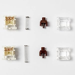 Gateron Switches accessories: plastic pieces and spring set.