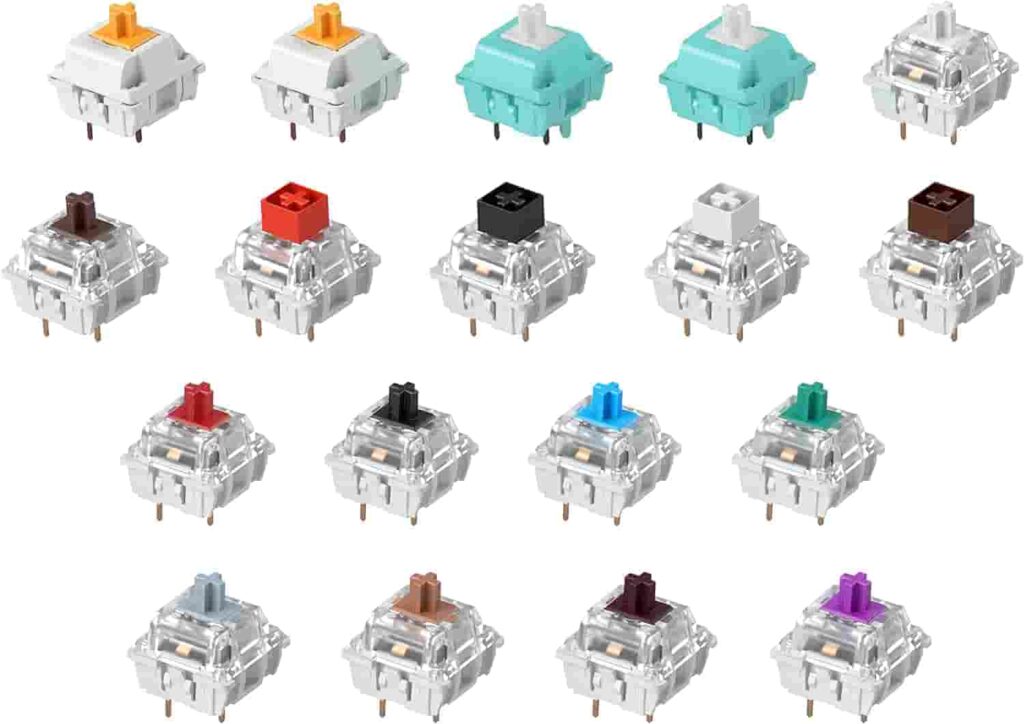 A selection of colorful push buttons on a white background, ideal for gaming with the best keyboard switches.

